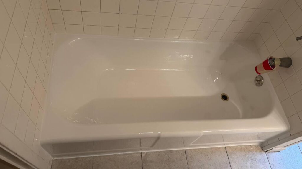 Bathtub refinished in white with the existing surrounding wall tile retained in a Downers Grove, IL home.